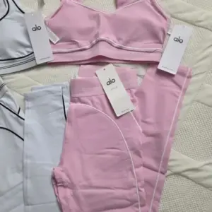 300 Alo Yoga Leggings, Bras, Hoodies & Joggers, Tagged, Sold as One Lot